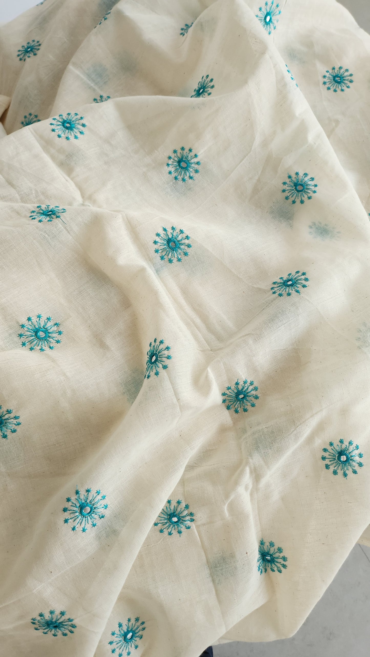 Pure Kora Cotton with Turguoise Sun Embroidery and Mirror Work