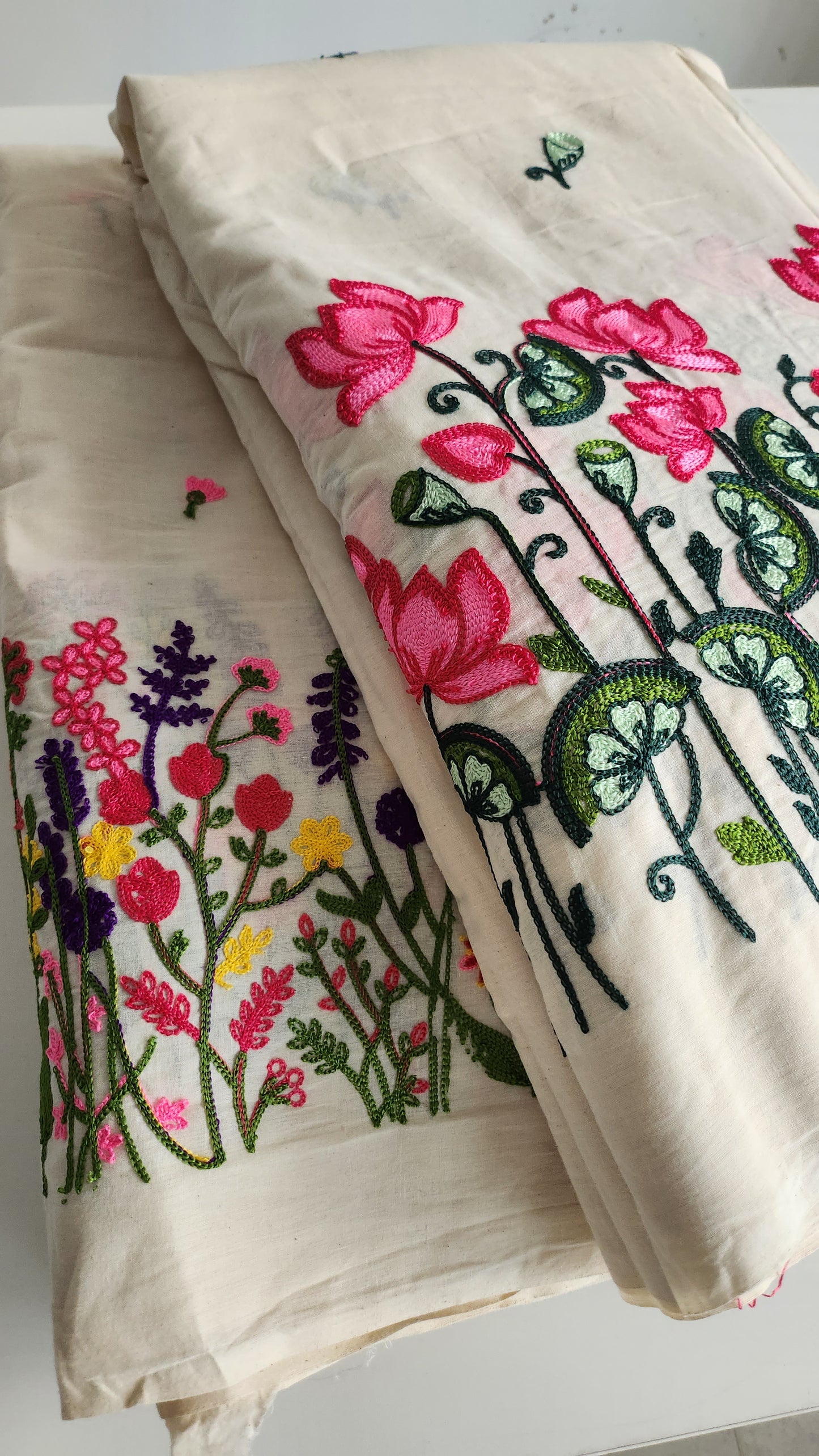 Pure kora cotton with beautiful floral and leaf embroidery work with daman and butti all over