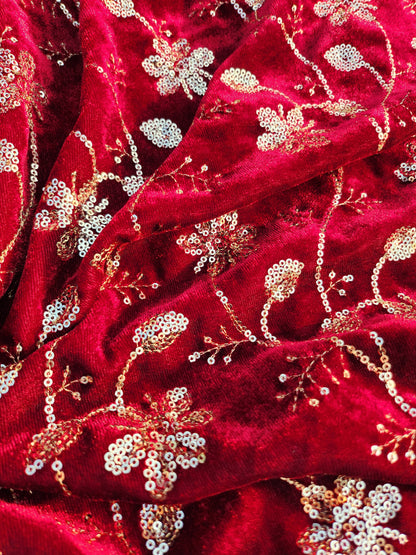 Pure velvet 9000 fabric and comes with beautiful floral trail embroidery maroon color with hand woven sequence work