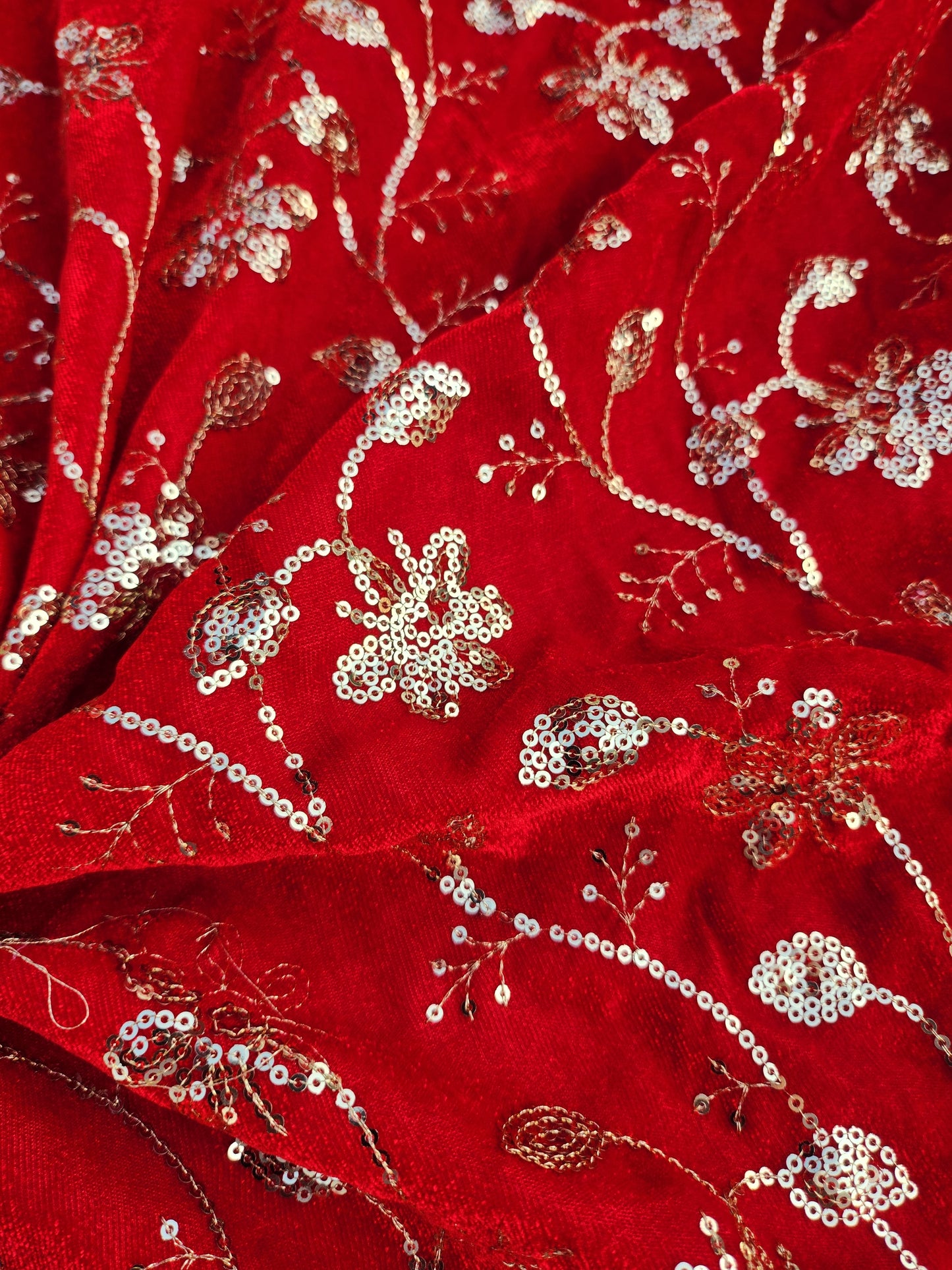 Pure velvet 9000 fabric and comes with beautiful floral trail embroidery with hand woven sequence work