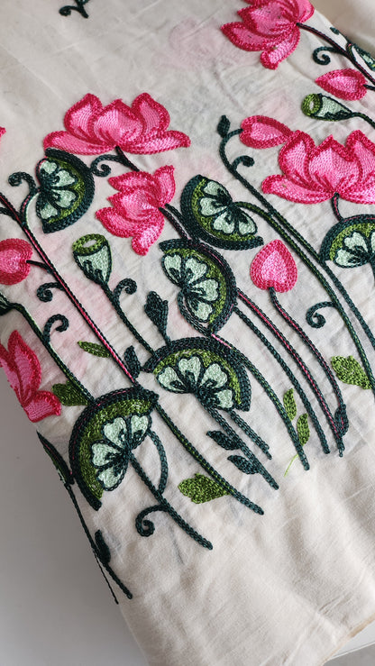 Pure kora cotton with beautiful lotus and leaf embroidery work with daman and butti all over