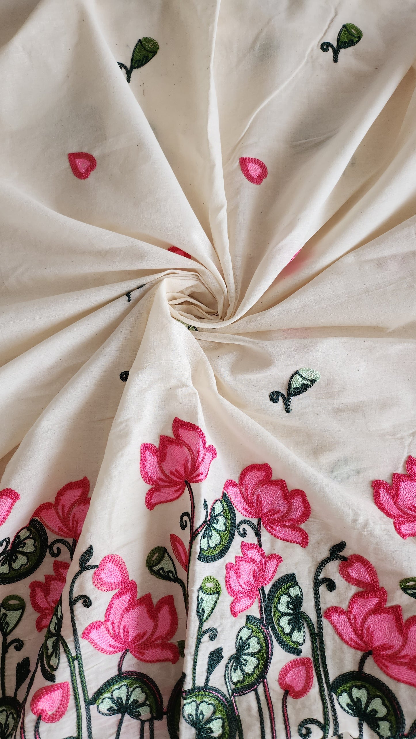 Pure kora cotton with beautiful lotus and leaf embroidery work with daman and butti all over