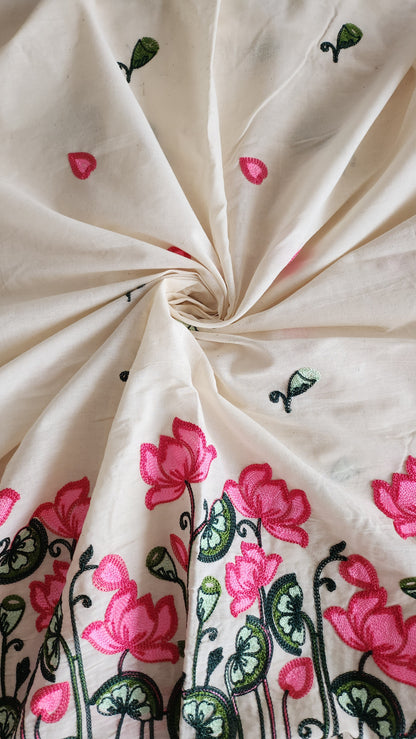 Pure kora cotton with beautiful lotus and leaf embroidery work with daman and butti all over