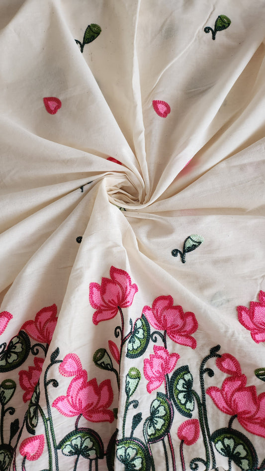 Pure kora cotton with beautiful lotus and leaf embroidery work with daman and butti all over
