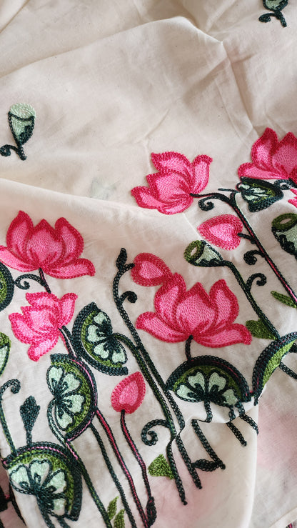 Pure kora cotton with beautiful lotus and leaf embroidery work with daman and butti all over