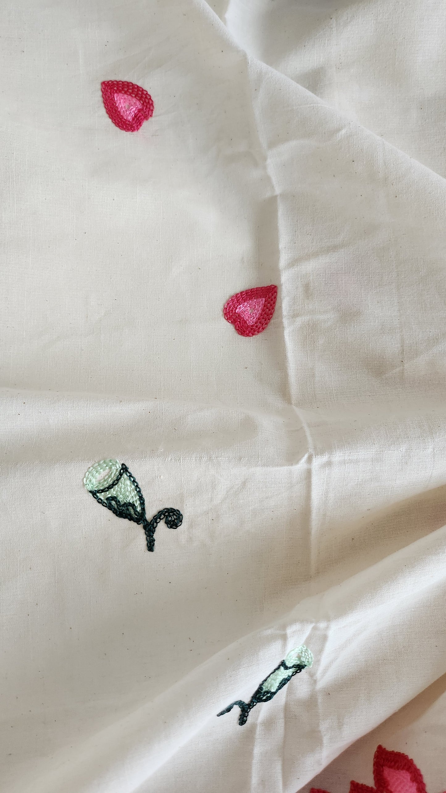 Pure kora cotton with beautiful lotus and leaf embroidery work with daman and butti all over