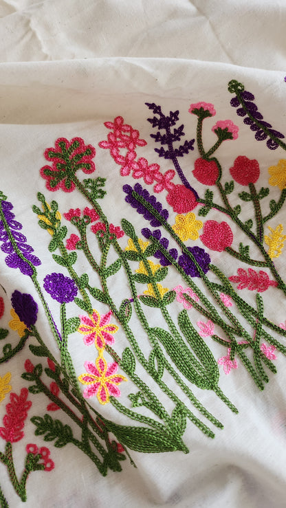 Pure kora cotton with beautiful floral and leaf embroidery work with daman and butti all over