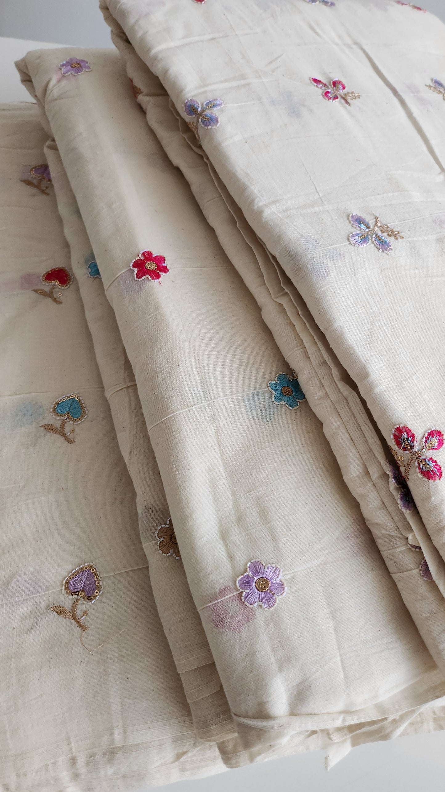 Pure kora cotton multi color three petal embroidery with sequence work